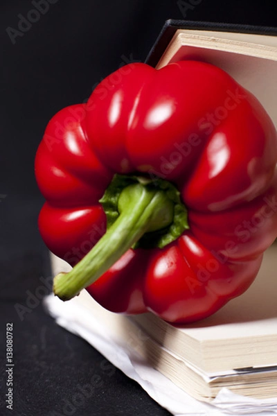 Obraz red paprika in the book