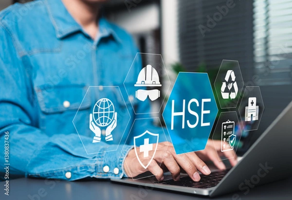 Obraz HSE Concept for Workplace Health and Safety. Businessman using laptop with icons representing health, safety, and environmental protection, illustrating HSE management system in business. work safety,