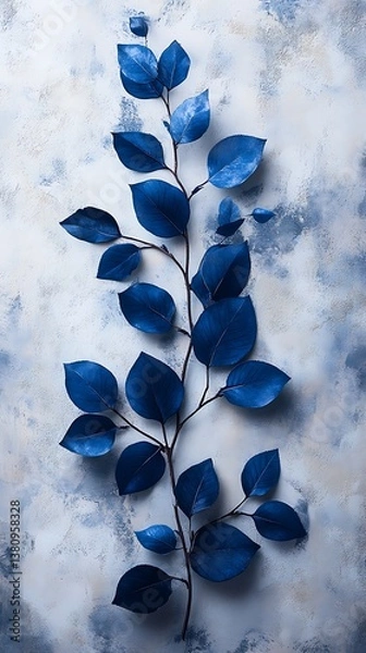 Obraz Slender Branch with Vibrant Blue Leaves Against a Textured Muted Blue and Gray Background