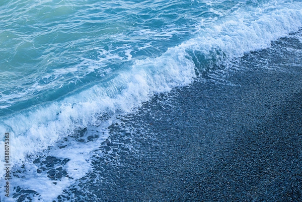 Obraz Seashore, pebbles and a small wave
