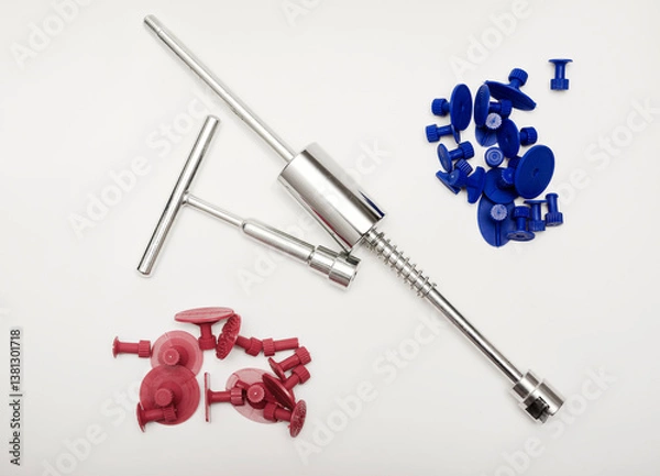 Obraz Metal reverse hammer for straightening car body dents. plastic mushrooms for fixing dents.