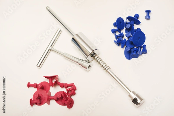 Obraz Metal reverse hammer for straightening car body dents. plastic mushrooms for fixing dents.