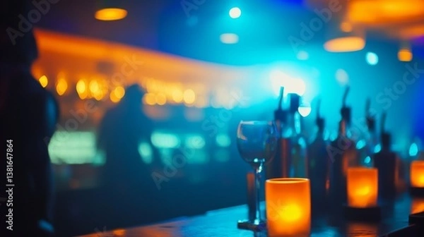 Fototapeta Blur Background of Colorful Bokeh Lights and Soft Focus Effect in Nightclub Atmosphere with Blue and Orange Tones. Defocused Image for Background.