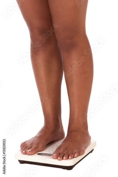 Obraz ethnic woman legs standing on bathroom scales