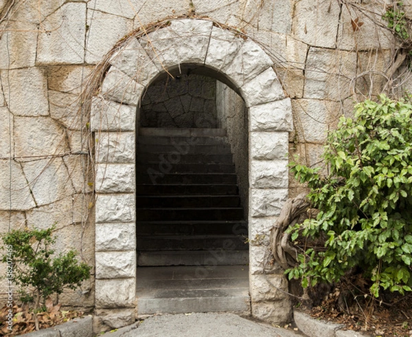 Fototapeta stone arch with internal stairs