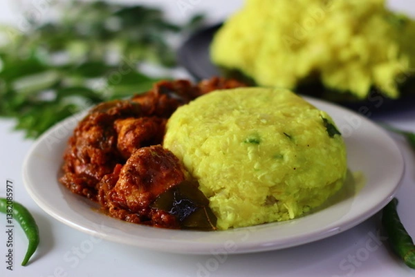 Obraz Boiled and mashed tapioca served with rich and spicy chicken curry, infused with aromatic spice