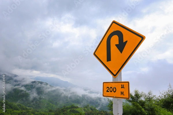 Fototapeta U-turn sign on the Highway Route 12 connects Phetchabun and Phitsanulok provinces. It has beautiful landscapes and mountain views
