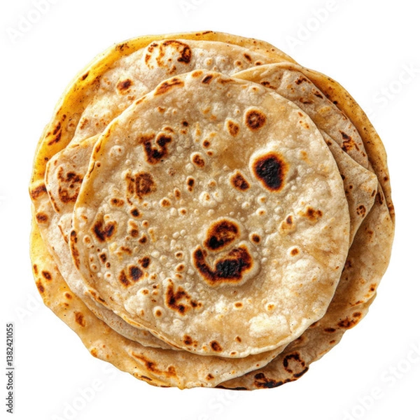 Fototapeta A top view of a stack of freshly made roti or flatbread on a black background with light and shadow