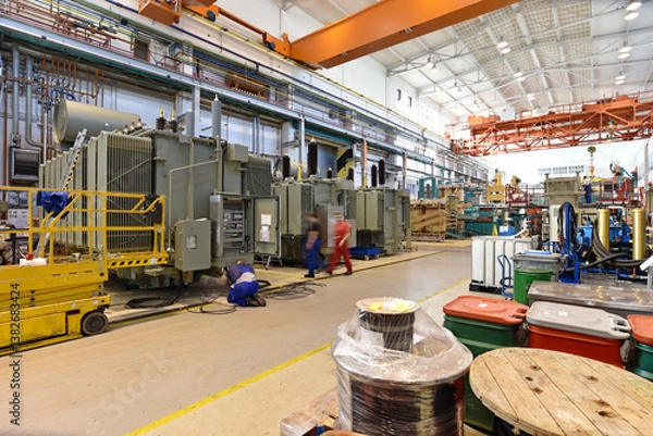 Fototapeta industrial factory in mechanical engineering for the manufacture of transformers - interior of a production hall