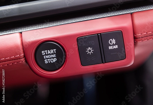 Fototapeta Car dashboard with focus on engine start stop button
