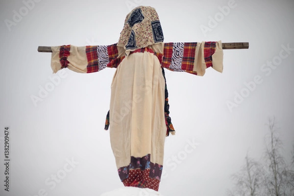 Fototapeta Maslenitsa in Russia. Scarecrow on the mountain. Farewell to spring. Burning a mannequin.