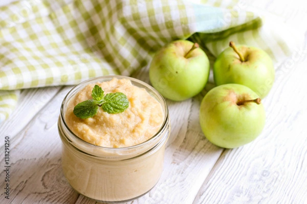 Fototapeta A bowl af apple sauce with cinnamon
