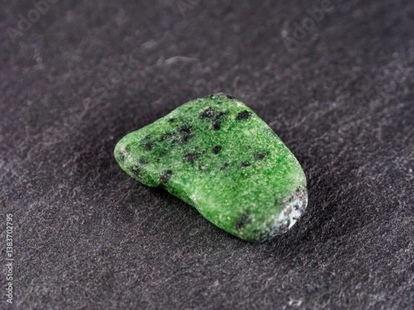 Fototapeta Zoisite silicate mineral that occurs in a variety of colors, including green blue pink violet and is used as a gemstone.