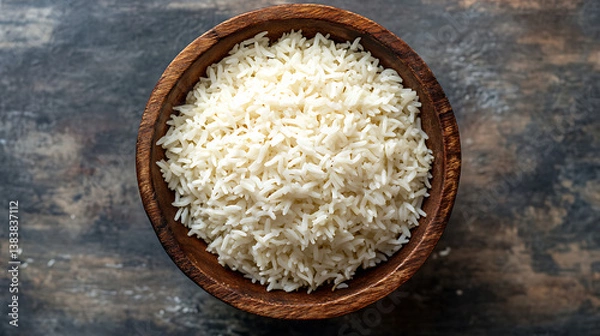 Fototapeta Biryani rice, in a wooden bowl top view