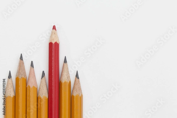 Fototapeta red and yellow pencils on white background