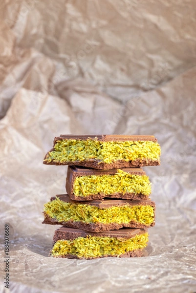 Fototapeta Luxury trending Dubai chocolate with creamy pistachio filling and crispy kataifi dough. Middle Eastern sweets