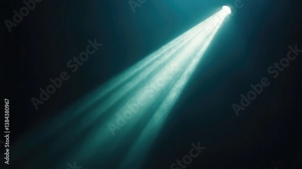 Obraz Cinematic spotlight beam shining in deep darkness, creating a dramatic contrast and copy space. No text, no people.
