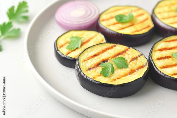 Obraz Grilled eggplant slices topped with fresh herbs create delicious plant based dish perfect for healthy recipes