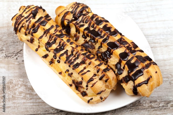 Fototapeta Eclair with custard