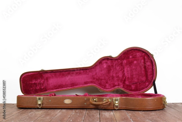 Obraz Musical instrument - Side view Open brown electric guitar hard case