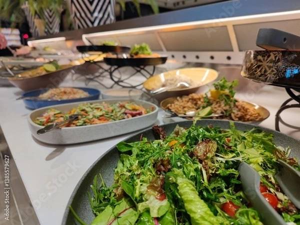 Fototapeta Delicious diverse salads in bowls at a self service buffet restaurant in a luxury hotel