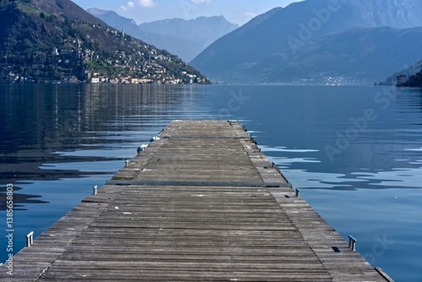 Fototapeta Boat dock on Lake Lugano near Porto Ceresio opposite Morcote.