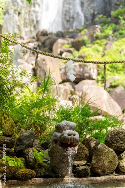 Fototapeta Hiro Jinja Shrine at Nachi Waterfall is Japan's tallest waterfall, This waterfall is part of the Sacred Sites and Pilgrimage Routes in the Kii Mountain Range