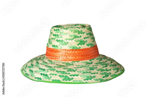 Fototapeta a woven straw sun hat with green geometric patterns and an orange band, isolated on a transparent background.