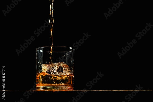 Obraz Bourbon in a glass on old wood table