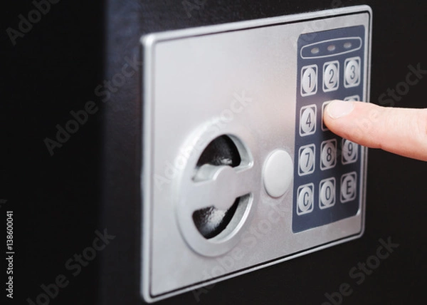 Obraz man hand opened a safe, close up