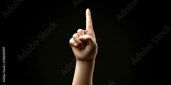Fototapeta Hand Pointing Up with Pink Nails on a Dark Background