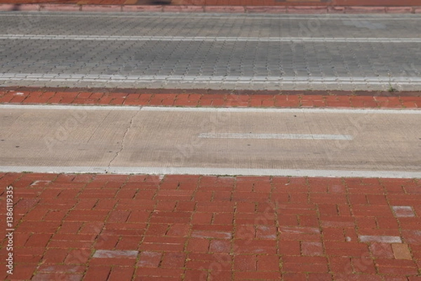 Obraz A section of an asphalt road with a curb stone and a lawn, minimalism, urbanism, 25