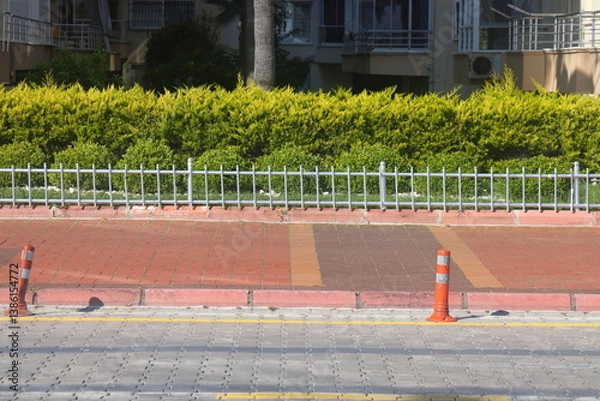 Obraz A section of an asphalt road with a curb stone and a lawn, minimalism, urbanism, 25