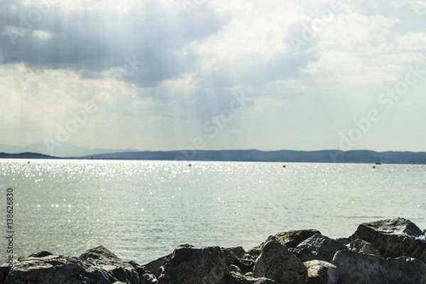 Obraz Rays of the sun over the lake