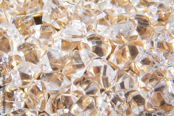 Obraz A collection of transparent gem-like crystals on a shiny gold background, creating a glamorous and opulent aesthetic, ideal for jewelry or holiday decor.