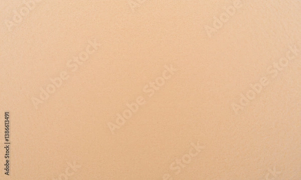 Fototapeta smooth, light brown surface with subtle texture, resembling kraft paper, ideal for various creative projects and backgrounds. warm tone adds natural feel to designs