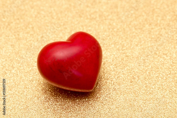 Fototapeta big red heart on golden background