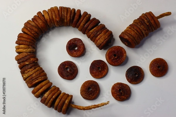 Obraz Dried figs on a string, showing rich texture and sweetness