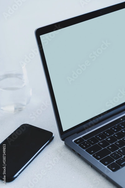 Fototapeta Close-up of a modern laptop with a blank light blue screen