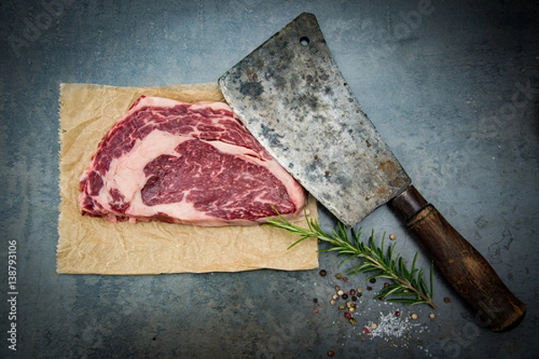 Obraz Steak-roh-Fleischerbeil