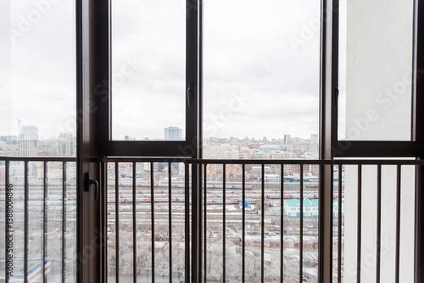 Fototapeta the balcony of an apartment on the upper floors of an apartment building