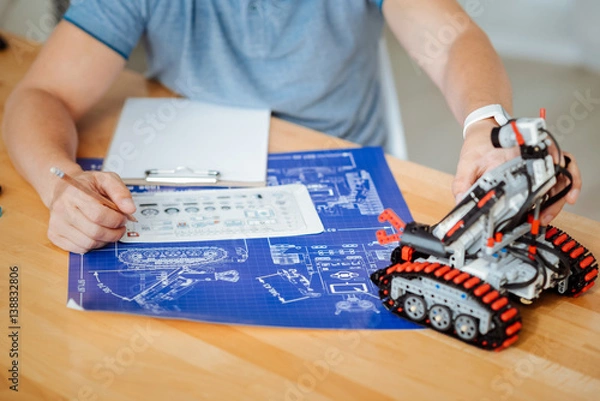 Obraz Professional engineer drawing schemes