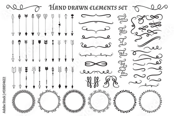 Fototapeta Gold decorative hand drawn design elements big set: arrows, frames, swirls, deviders and flourishes. Vector illustration.