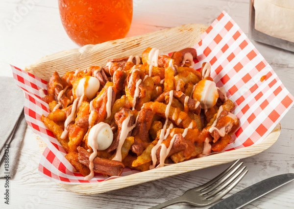 Obraz Colombian food: salchipapas with quail eggs.