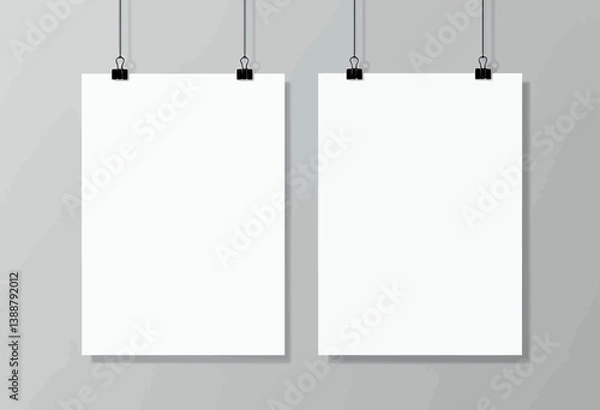 Obraz Two White Posters Hanging with Black Clips on Gray Wall