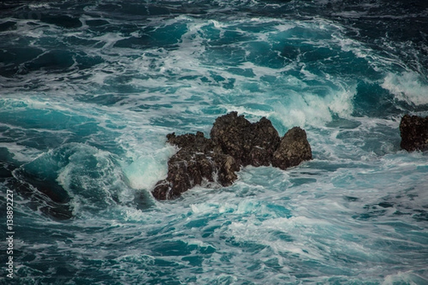 Obraz Blue raging waves crashing on the rocks in tne Atlantic ocean