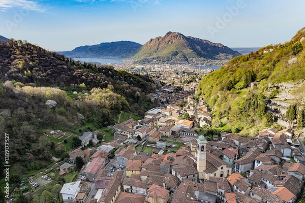 Fototapeta Lecco city and Barro peak at sunset, drone view