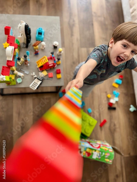 Obraz Happy Child Playing with Colorful Building Blocks
