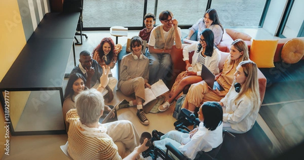 Fototapeta Group of undergrad students in a casual setting having a lively discussion with diverse team collaboration and brainstorming