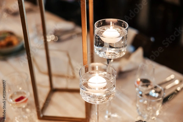 Fototapeta A graceful candle stand, glowing softly, casting warm light and quiet charm. Each flame adds a touch of magic to the atmosphere of love and celebration